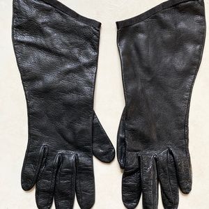 Mid length black leather gloves